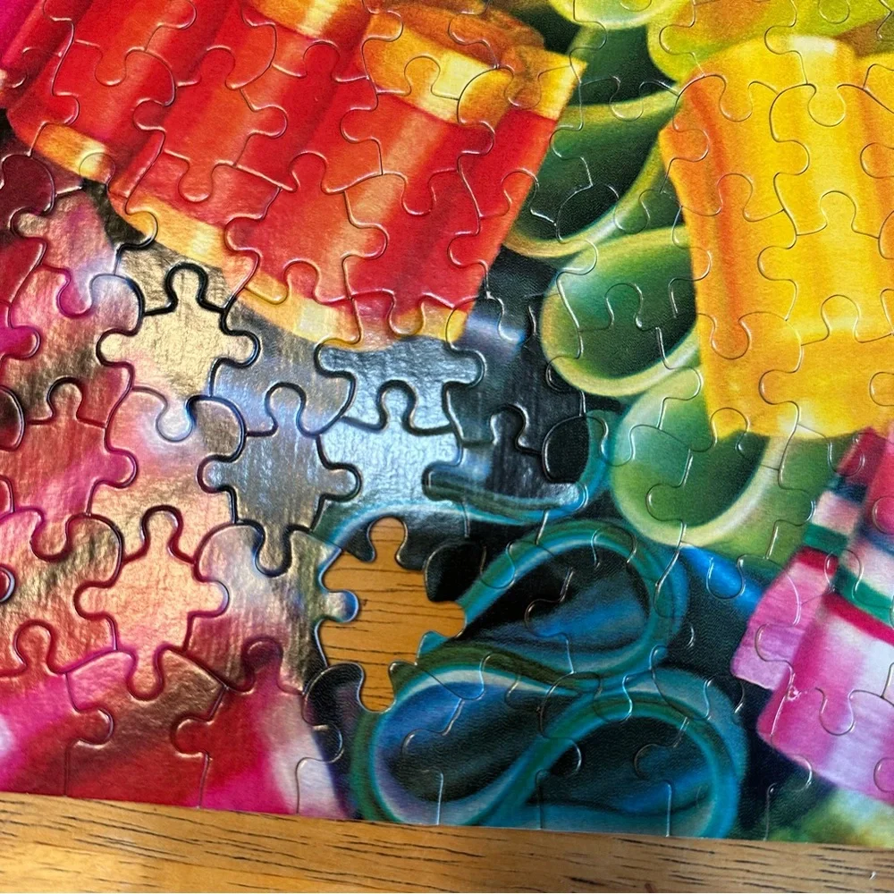 CEACO 549pc Holiday Sweets ribbon candy jigsaw puzzle.